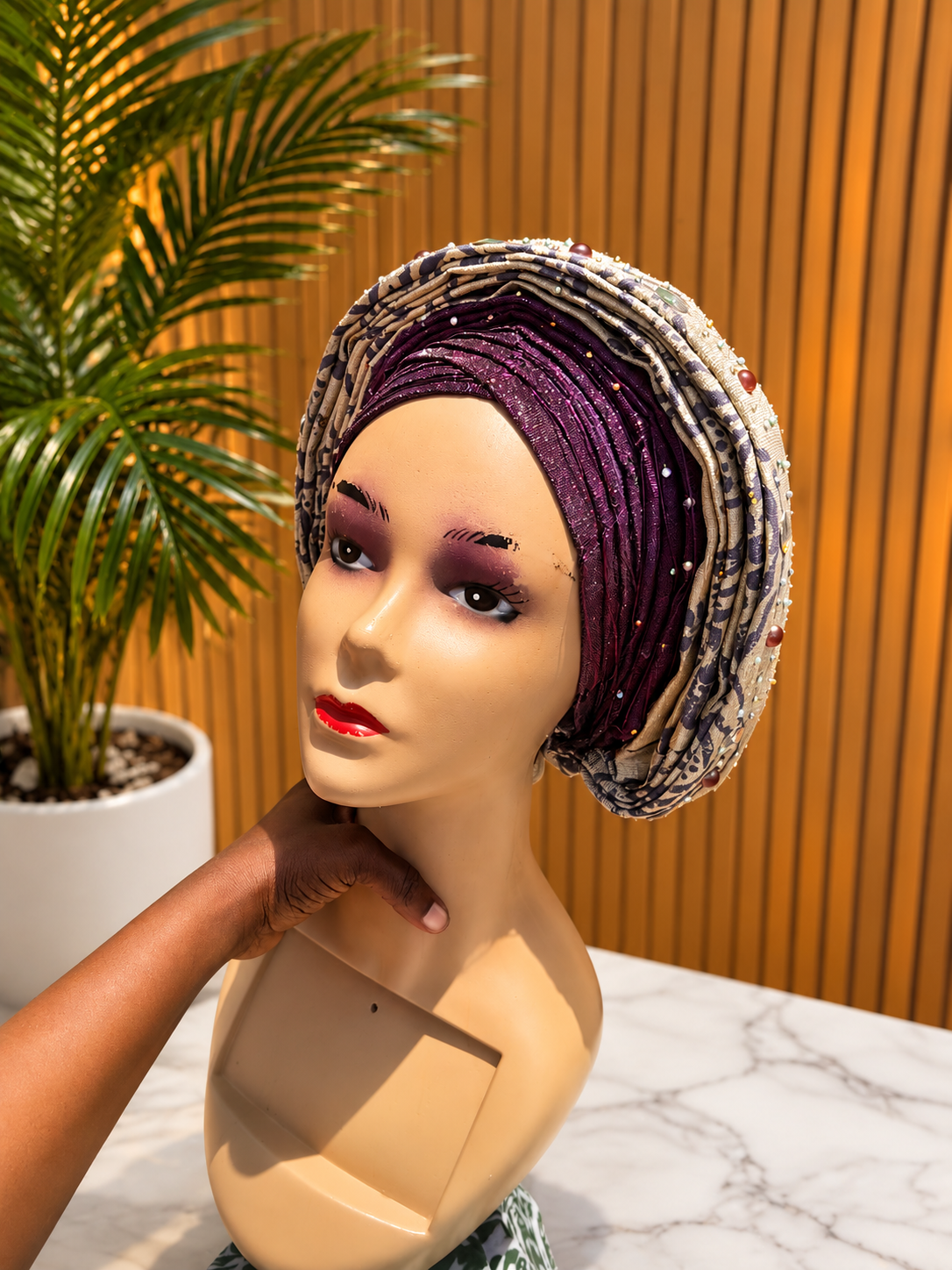 Pleated gele with embellishments